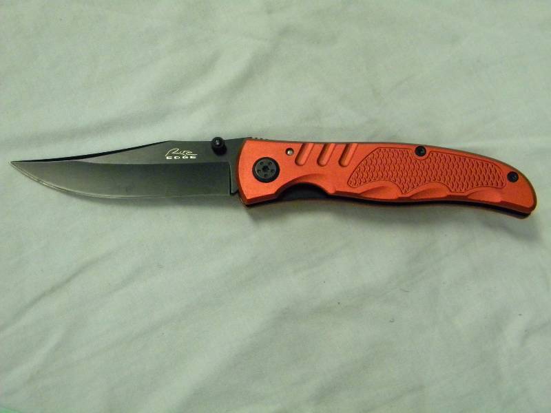 lot 27 image: Right Edge Folding Knife