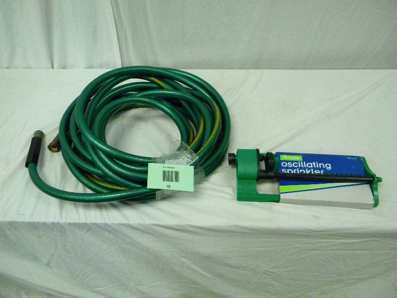 lot 70 image: Garden Hose and Sprinkler