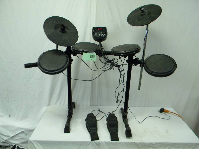lot 75 image: Electric Drum Set
