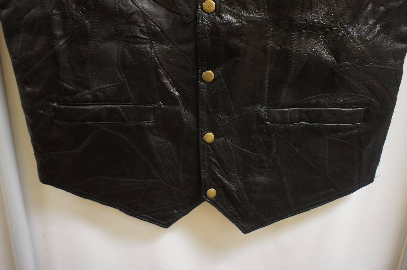 lot 11 image: Italian Stone Design Genuine Leather Vest
