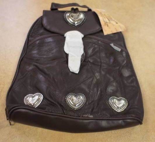 lot 41 image: Embassy Buttery Soft Genuine Leather Mini Backpack