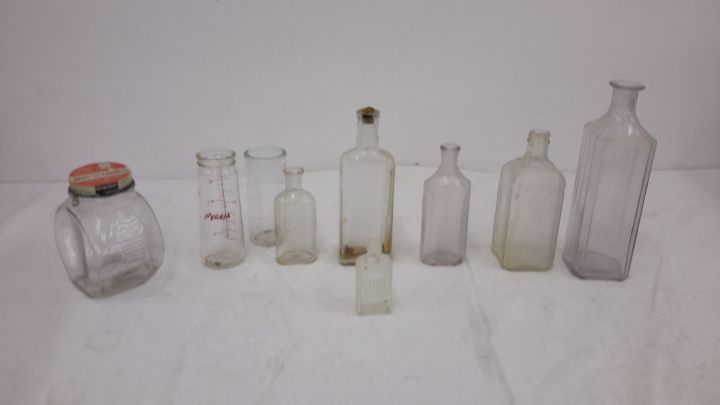 lot 3 image: collectable glass bottles