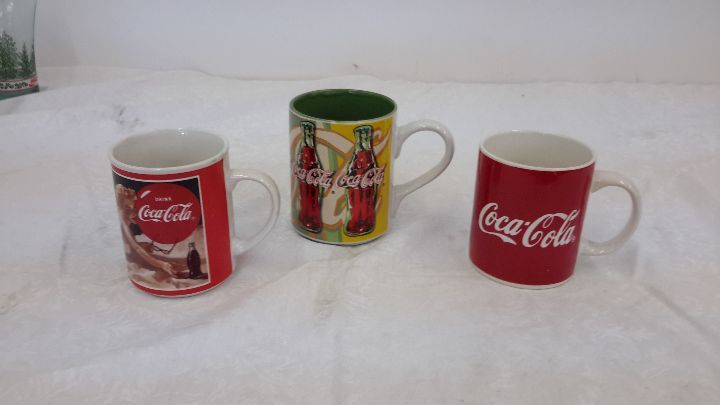 lot 23 image: Coca-Cola mugs