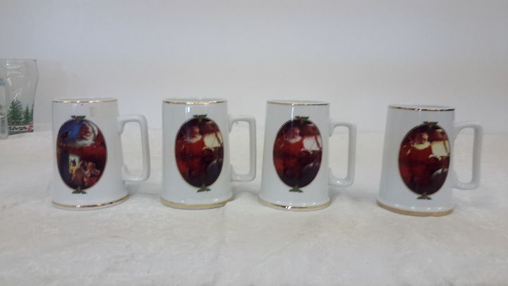 lot 24 image: Coke collector mugs