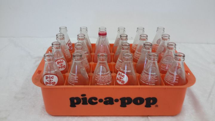 lot 84 image: pic a pop bottles, coke bank
