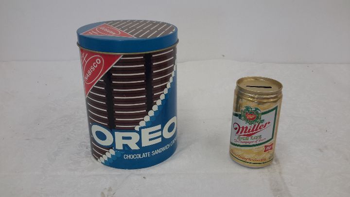 lot 92 image: Metal oreo can, miller high life bank