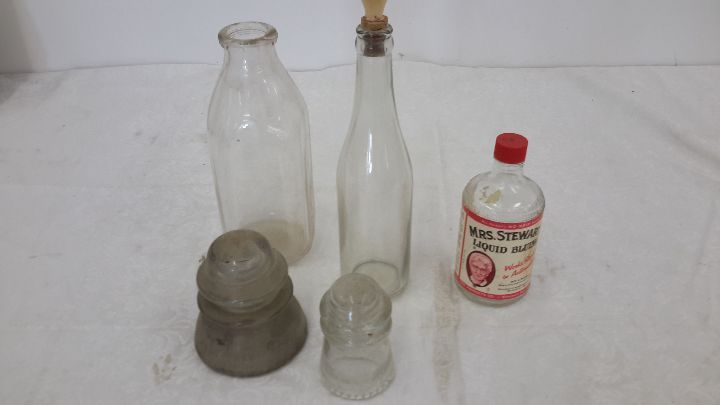lot 153 image: Glass insulators, bottles, milk bottle