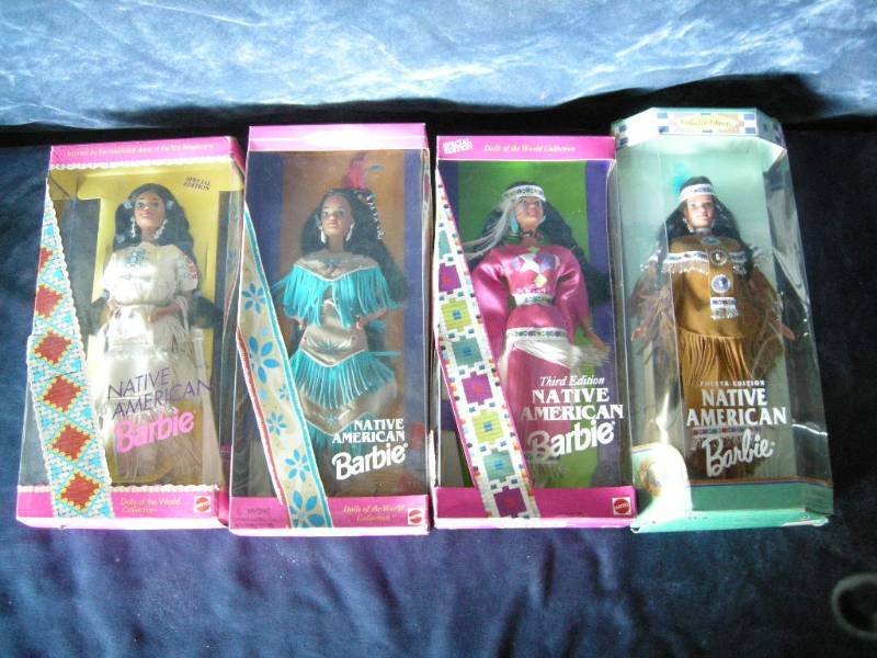 lot 19 image: 4 Native American Barbies