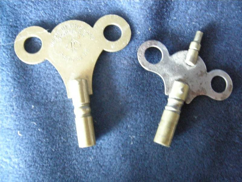 lot 22 image: Antique clock winding keys