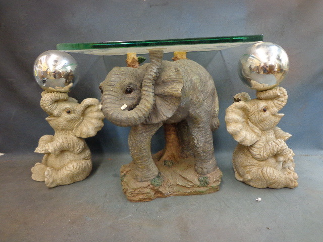 lot 90 image: Elephant lawn ornaments