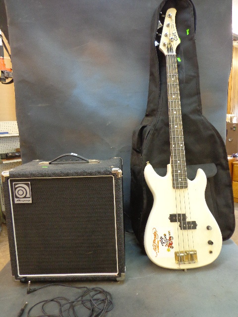 lot 112 image: Bass guitar and amp