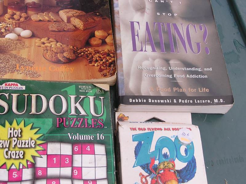 lot 15 image: ASSORTMENT OF BOOKS AND A CARD GAME.