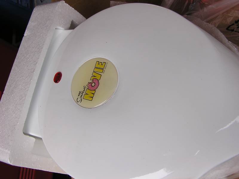 lot 100 image: HOMER SIMPSON DONUT MAKER (u.k. power plug) NEW