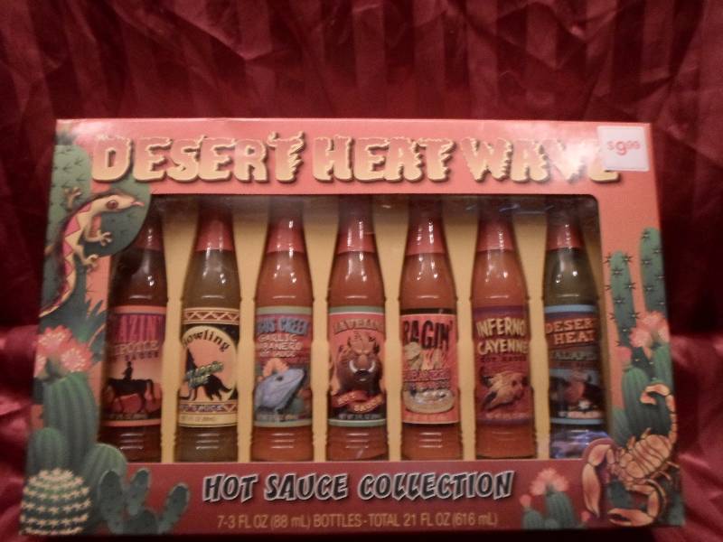 lot 17 image: Lot of 7 Desert Heat Wave Hot Sauce...
