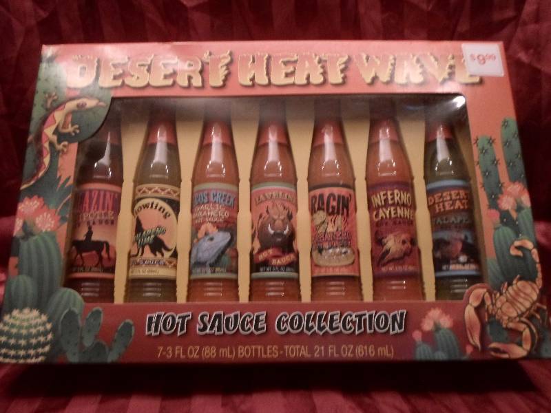 lot 18 image: Lot of 7 Desert Heat Wave Hot Sauce...