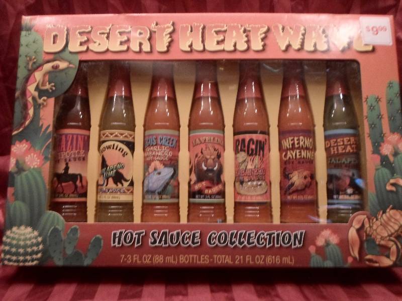 lot 19 image: Lot of 7 Desert Heat Wave Hot Sauce...