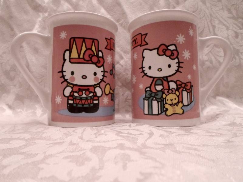 lot 26 image: Lot of 2 Hello Kitty Mugs...