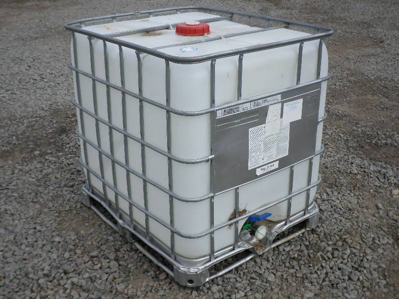lot 5 image: Schutz Industrial 300-Gallon Caged ...