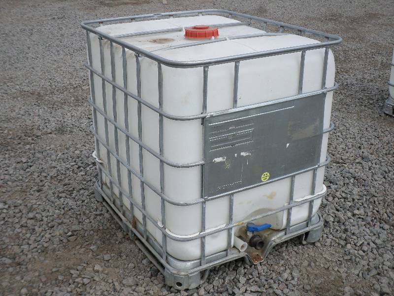 lot 6 image: Schutz Industrial 300-Gallon Caged ...