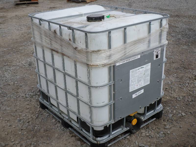lot 8 image: Schutz Industrial 300-Gallon Caged ...