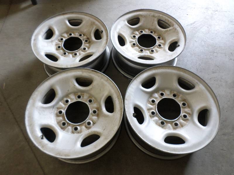 lot 48 image: Set Of (4) 8-Lug 16 Steel rims ...