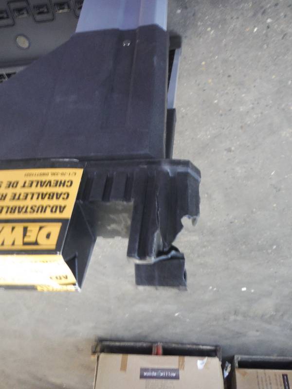 Set of mismatched Horses, 1-Dewalt Adjustable Metal Legs Sawhorse, crack on top still works fine and1-Workforce 28 in. Folding Sawhorse $34.00