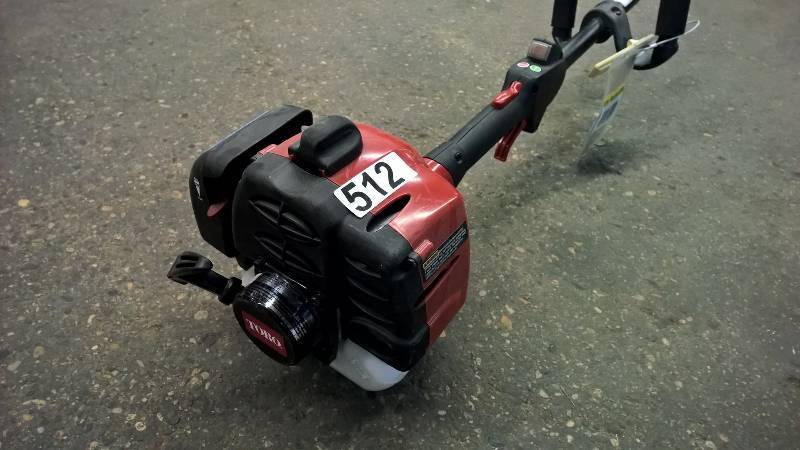 Toro 25.4cc Weed whip, Model 51977, Runs but needs new line feed on bottom.