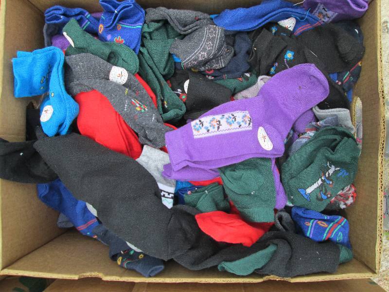 lot 20 image: whole bannana box of socks new grea...