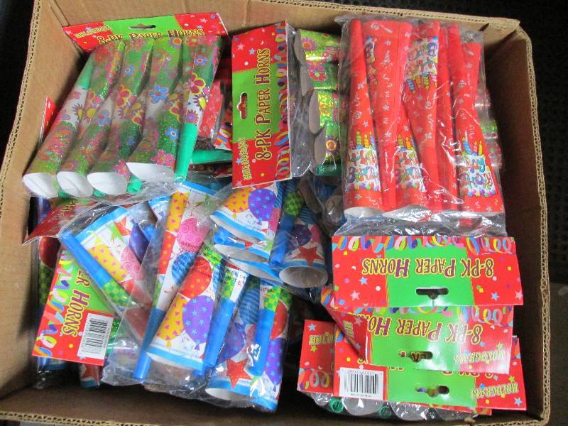 lot 23 image: bananna box of paper party horns ne...
