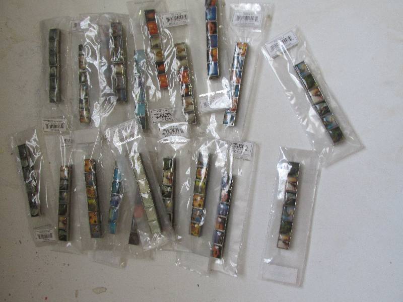 lot 56 image: 20 mini picture braclets ...