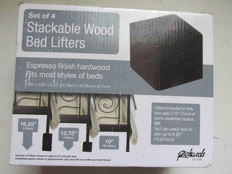 lot 88 image: set of 4 stackable wood bed lifters...