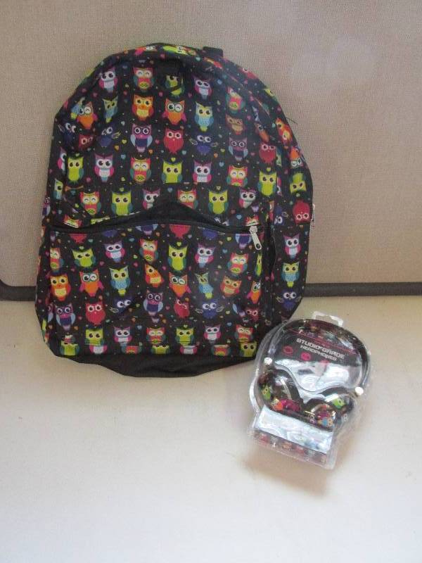 lot 98 image: matching backpack and head phones w...
