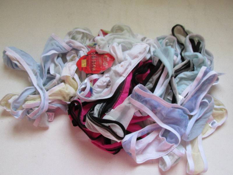 lot 100 image: lot of 20 thongs new with tags...