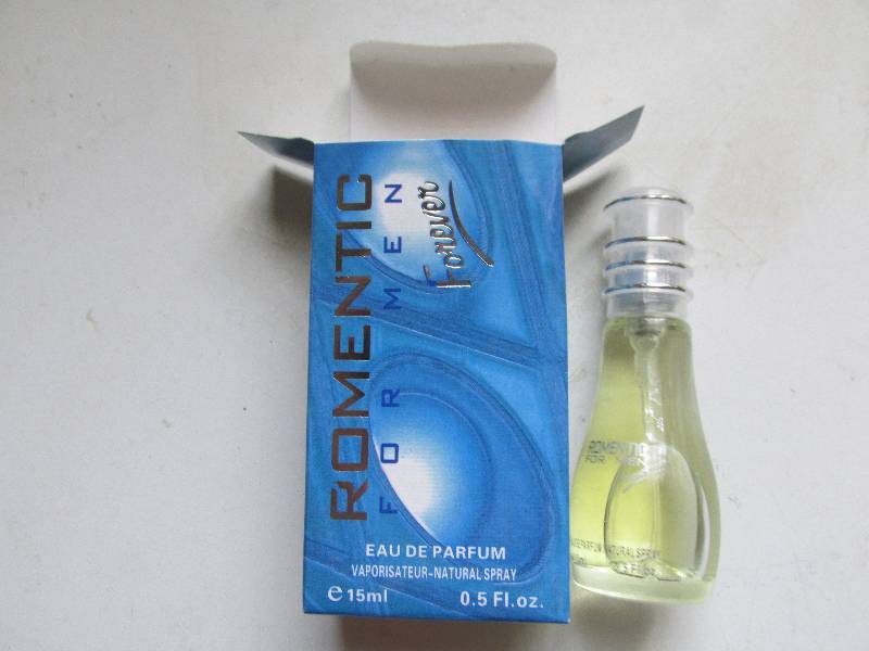 lot 144 image: 15 ml bottle of forever romantic fo...