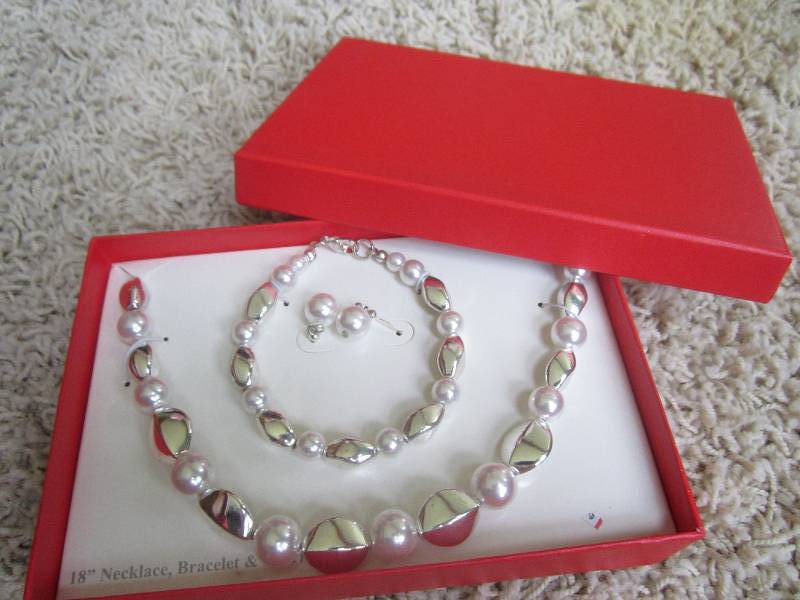 lot 202 image: Kmart 18 necklace, bracelet and e...