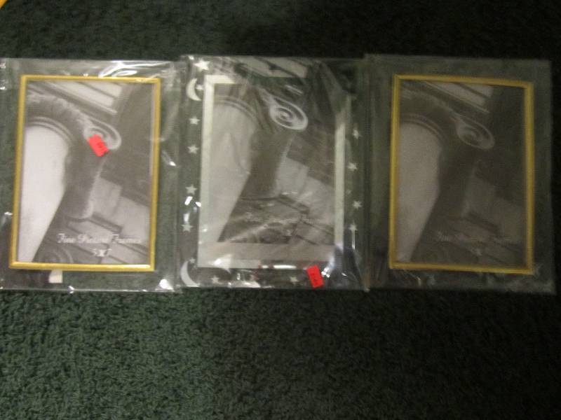 lot 232 image: 3 5x7 frames...