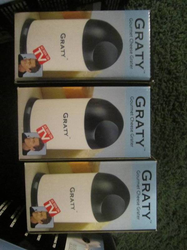lot 235 image: new slapchop and cheese graters...
