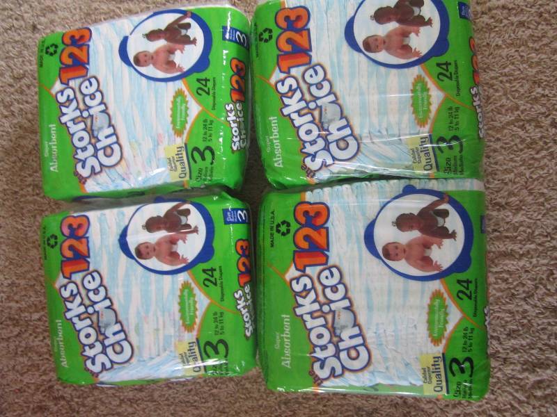 lot 243 image: 4 24 packs of dipers size 3...