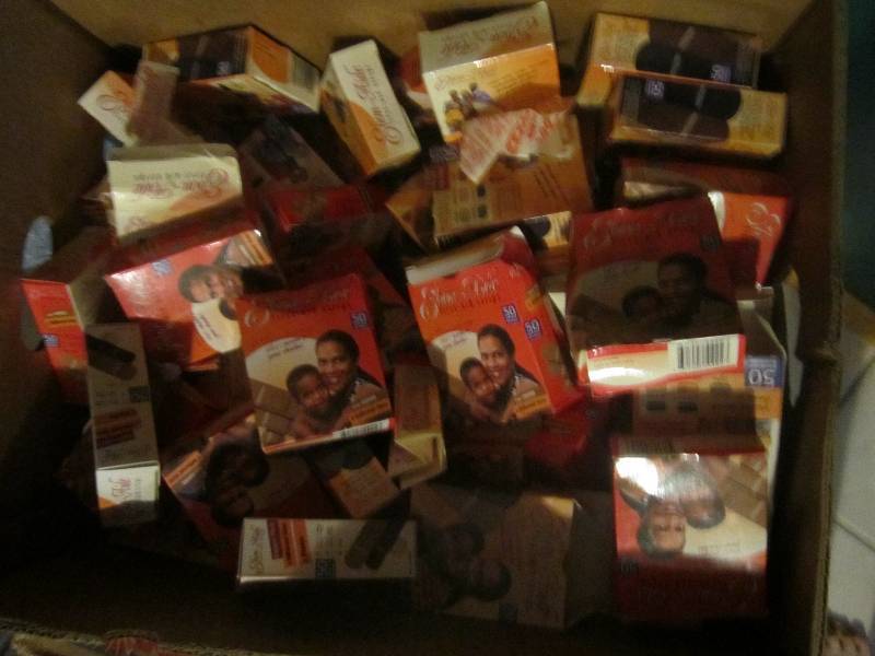 lot 245 image: half box of mixed color band aids...