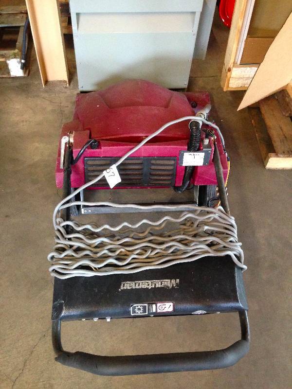 Minuteman wide floor vacuum