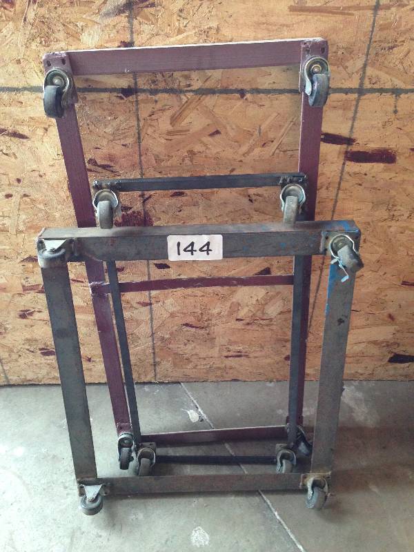 3 metal frames on casters