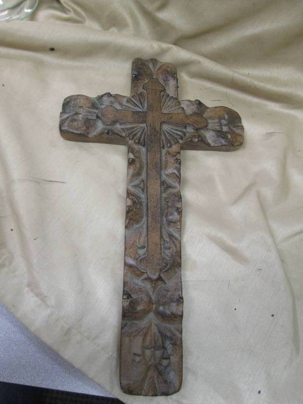 Rough-hewn carvings and an antique ...