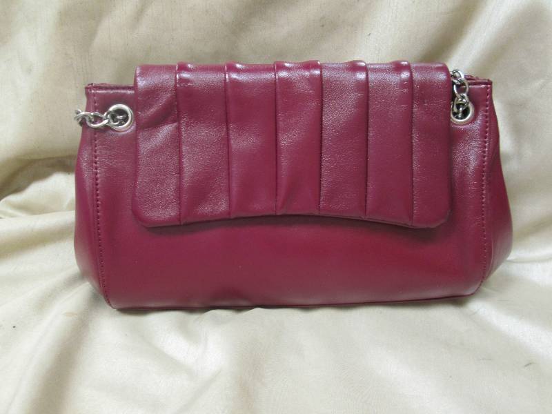 small dark red purse...