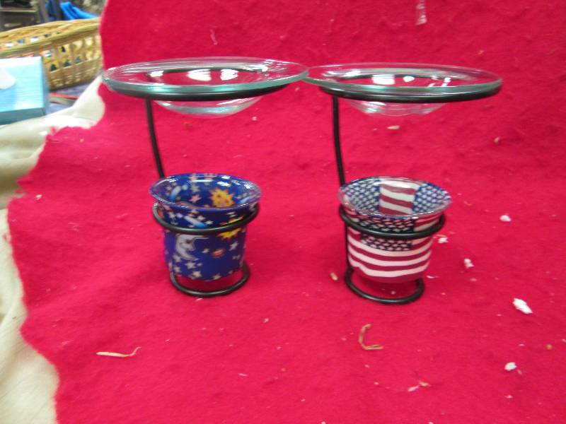 Qty 2 An oil warmer offering unique...