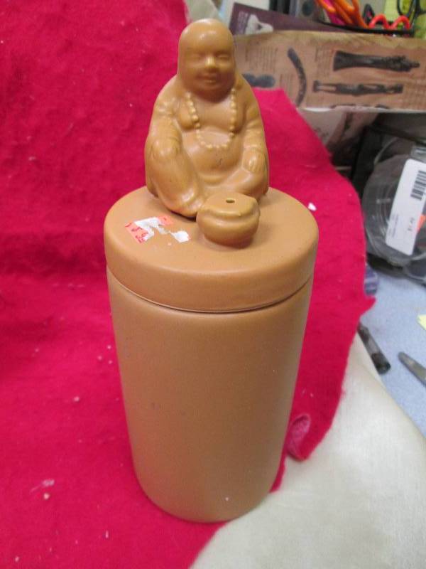 Store incense in this colorful jar ...