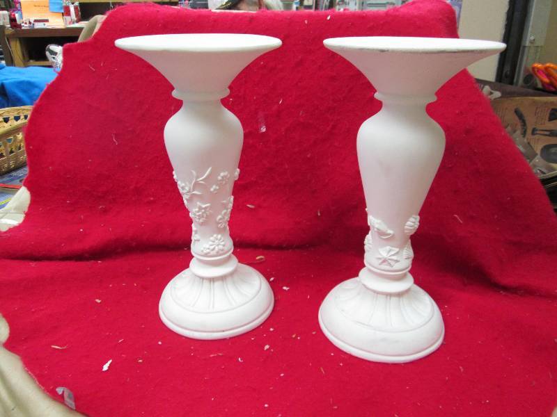 Qty 2 white candle holders...