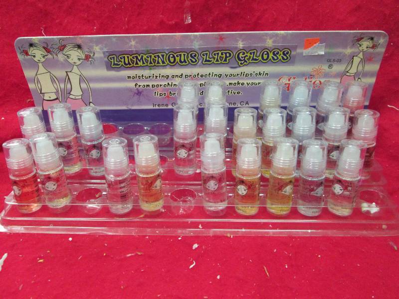Qty 25  Girlies Luminous lip gloss...