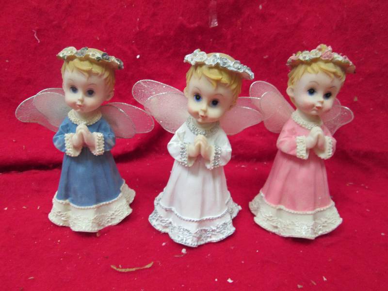 Qty 3 Angels white , blue, and pink...