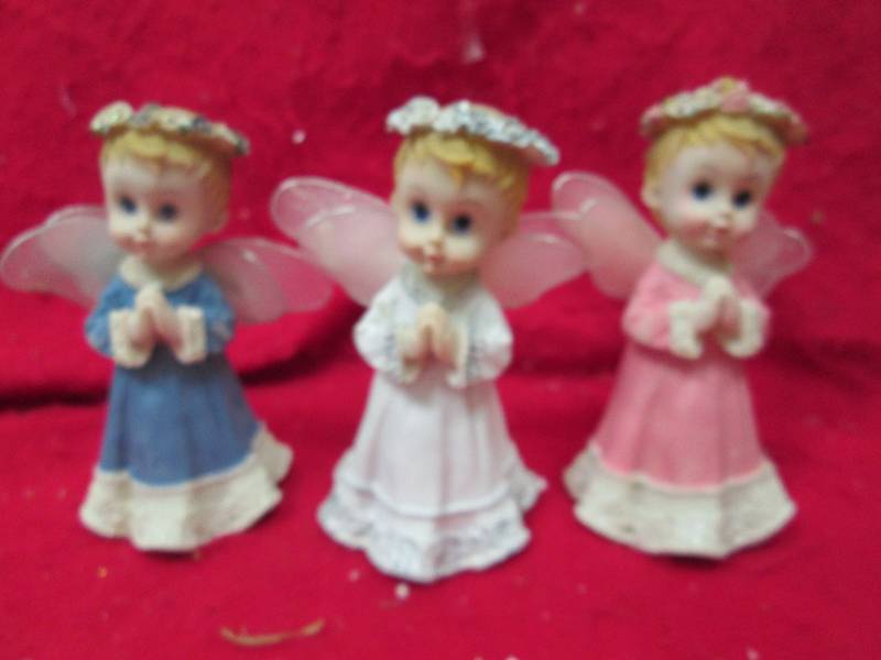 Qty 3 Angels white , blue, and pink...
