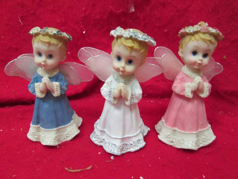 Qty 3 Angels white , blue, and pink...